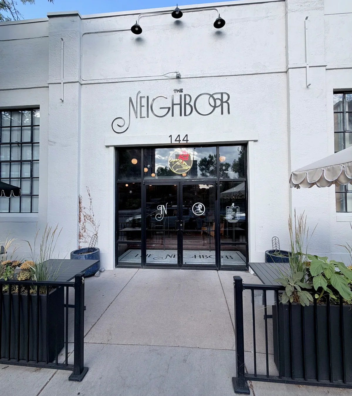 The Neighbor entrance at 144 South Mason Street in Old Town Fort Collins