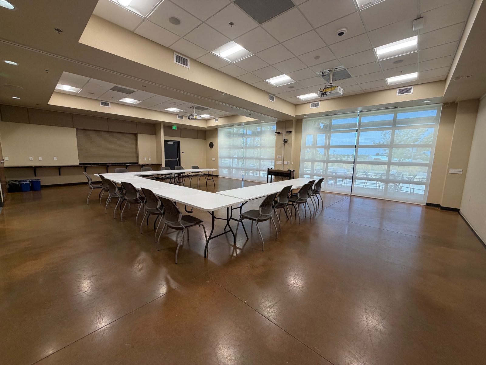 Timnath Town Center Community Room set with tables and chairs